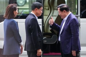 Xia Baolong, director of the Hong Kong and Macau Affairs Office (right), and Hong Kong Chief Executive John Lee at the Shenzhen Bay Control Point on June 17, after Xia’s two-day visit to Hong Kong. Photo: Jelly Tse