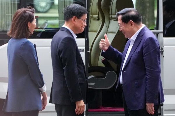 Xia Baolong, director of the Hong Kong and Macau Affairs Office (right), and Hong Kong Chief Executive John Lee at the Shenzhen Bay Control Point on June 17, after Xia’s two-day visit to Hong Kong. Photo: Jelly Tse