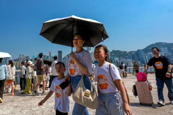 Hong Kong breaks record for hottest day as Typhoon Dolphin brings extreme heat
