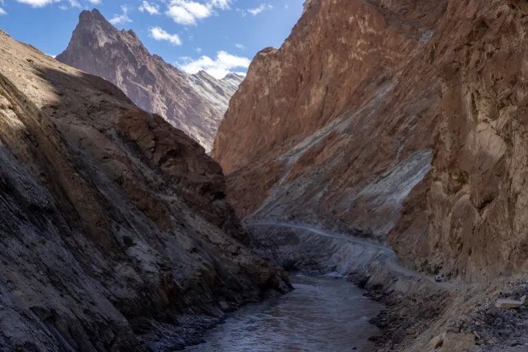A Border Roads Organisation (BRO) car carrying officials is seen on a highway under construction in the Ladakh region, in India, on September 17, 2020