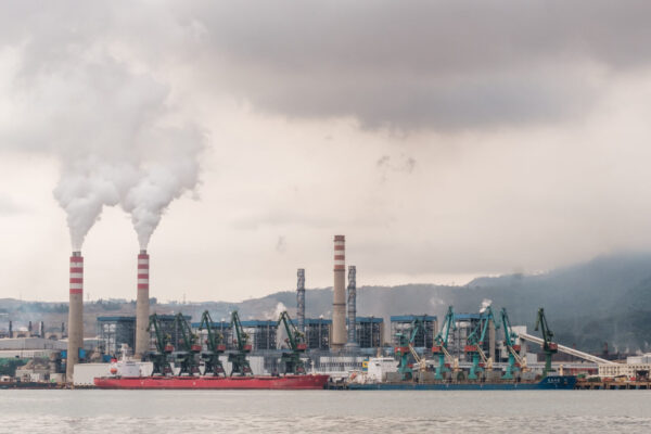 Chimneys from a smelter emit smoke from burning coal to refine nickel at the Indonesia Weda Bay Industrial Park (IWIP) in Weda Bay, on Halmahera Island, North Maluku, Indonesia