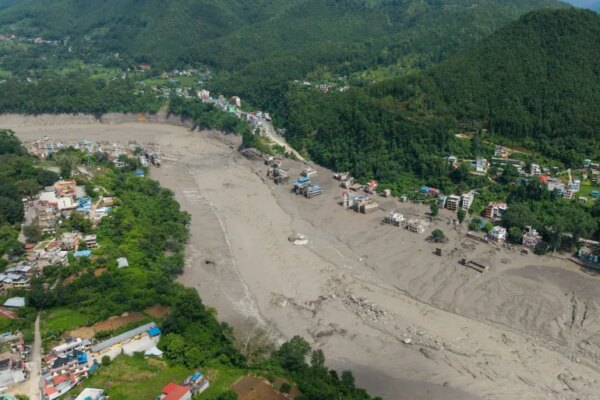 A drone view shows mud covering properties following the flash flood, in the Nuwakot district, Nepal, August 26, 2026 [Reuters]