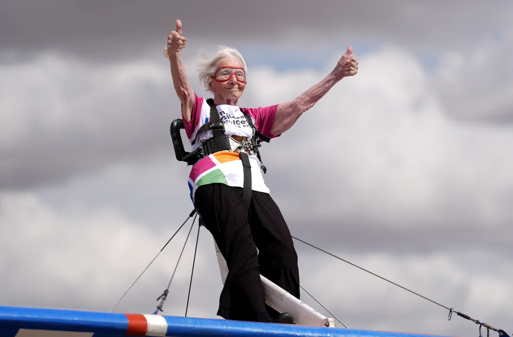 Betty Bromage, 97, giving a thumbs up after successfully completing her sixth wing walk.