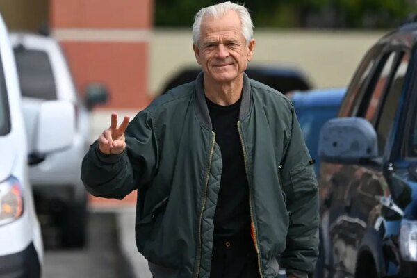 Peter Navarro, White House trade advisor to former US President Donald Trump, arrives to speak to the press at the Country Mall Plaza before reporting to the Federal Correctional Institution, in Miami, Florida on March 19, 2024.