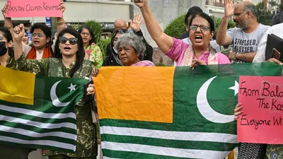 Women's rights activists shout slogans during a protest in Karachi following unrest during the first phase of polling for the local legislature in Pakistan-occupied Kashmir. (AFP)