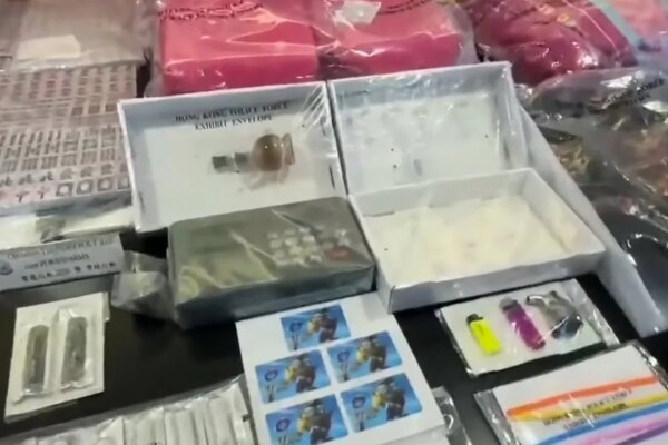 Boy, 14, among 57 arrested in crackdown on triad-linked debt collection ring