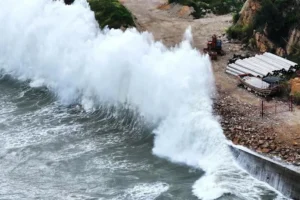 Huge waves crash on the coast of Huangqi in Lianjiang county, as Typhoon Dolphin approaches, in Fujian