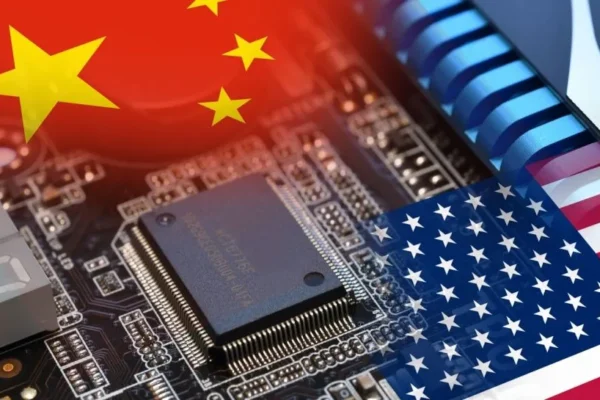 Microchip on a motherboard with Flag of China and USA. Concept for the battle of global microchips production.