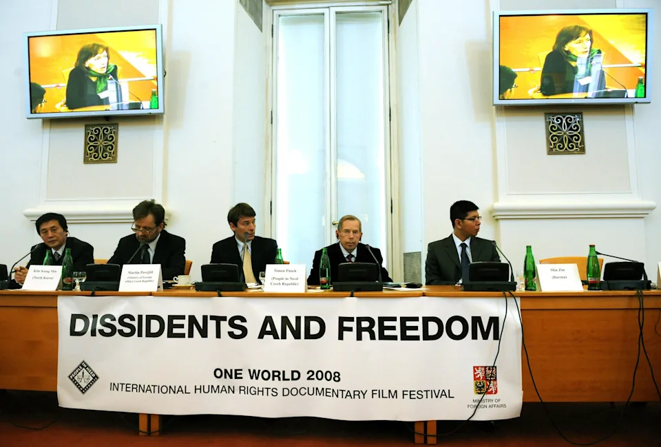 Michal Cizek/AFP via Getty Images, FILE - PHOTO: In this March 5, 2008, file photo, freedom activist Min Zin (far right) attends the Dissidents and Freedom forum at the Czech Foreign Ministry in Prague.