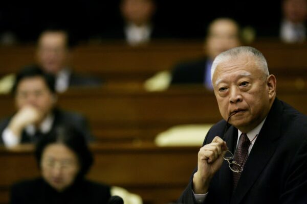 Tung Chee-hwa listens during a Legislative Council meeting in Hong Kong on October 14, 2004. Photo: Reuters