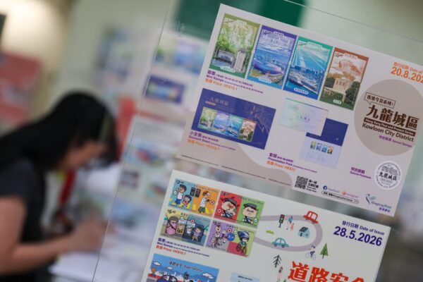 A stamp collector buys special stamps on the theme of “Hong Kong Past and Present Series: Kowloon City District” at General Post Office in Central, on August 20. Photo: Edmond So