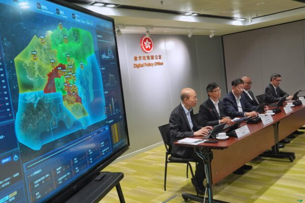 Officials from the Digital Policy Office brief the media on 30 initiatives to enhance public services efficiency, including the 1823 platform. Photo: Elson Li