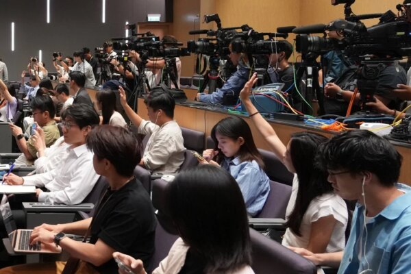 Hong Kong leader vows support for media’s global reach, to review TV practice code