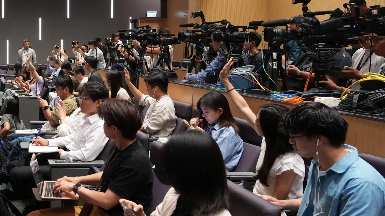 Hong Kong leader vows support for media’s global reach, to review TV practice code