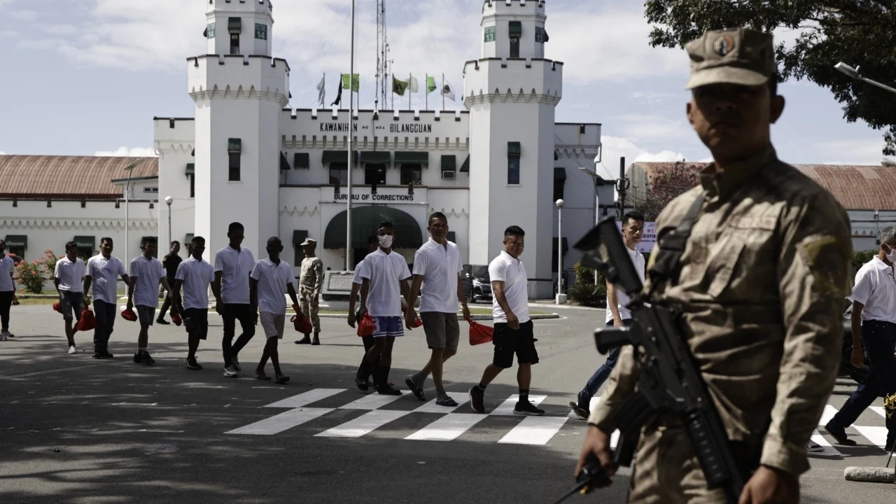 Freed Hongkonger sent back to jail as storm delays deportation from Philippines