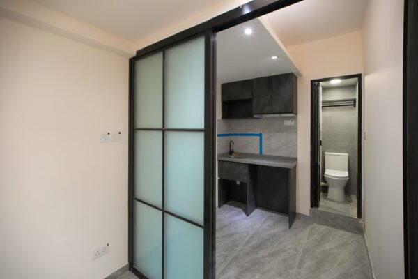 In July, a subdivided flat containing three basic housing units at Tsung Nga Building in Sham Shui Po was the first to be approved under the government’s new regulations. Photo: Dickson Lee