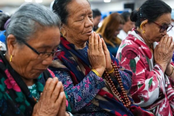 Hong Kong’s Nepalis gather for prayers on 13th day of flood mourning