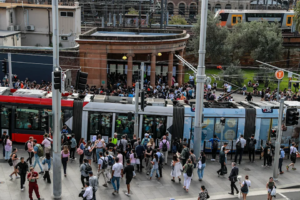 Crowds gather outside Sydney's Central Station during major transport disruption.