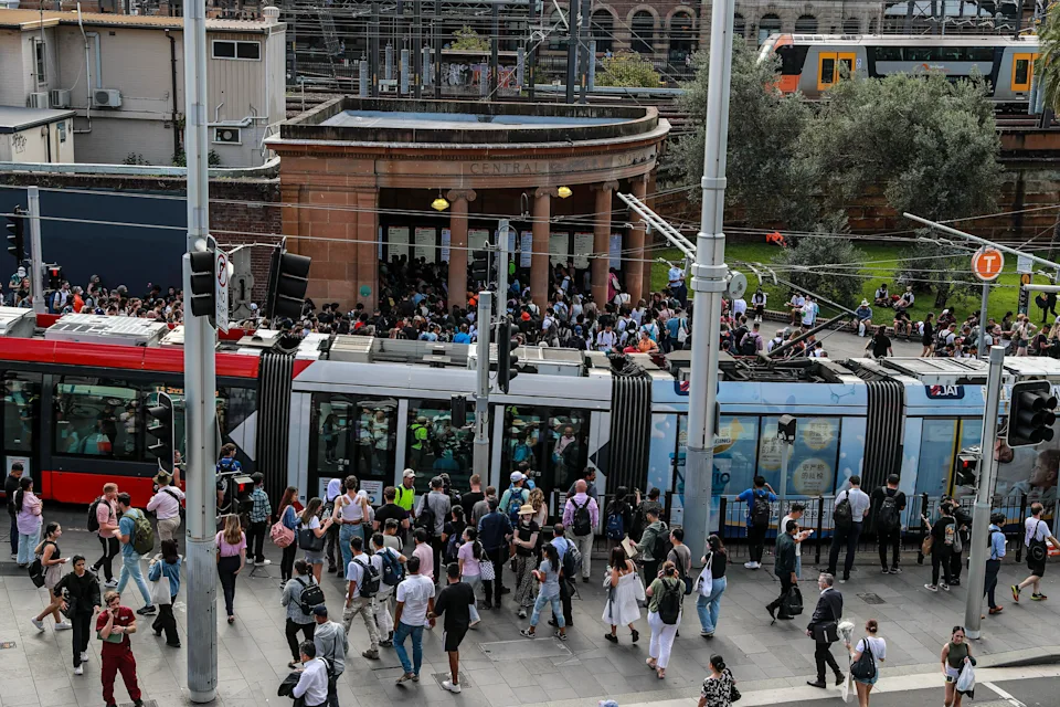 Crowds gather outside Sydney's Central Station during major transport disruption.