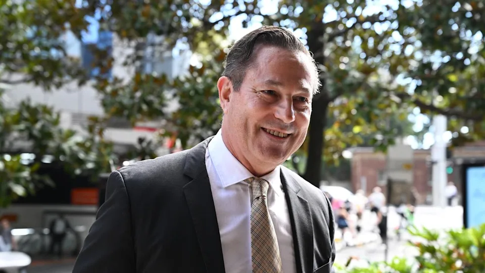 Csergo walks into court