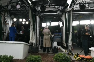 CNN White House reporter Betsy Klein, center, works in the CNN workspace outside the West Wing of the White House on Thursday. - Saul Loeb/AFP/Getty Images