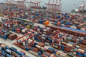 Shipping containers are seen ready for transport at the Guangzhou Port in the Nansha district in southern China's Guangdong province. (AP)