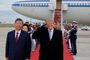 US President Donald Trump salutes next to Chinese President Xi Jinping as he arrives ahead of a state visit at Joint Base Andrews, Maryland, US, September 23, 202 (Reuters)